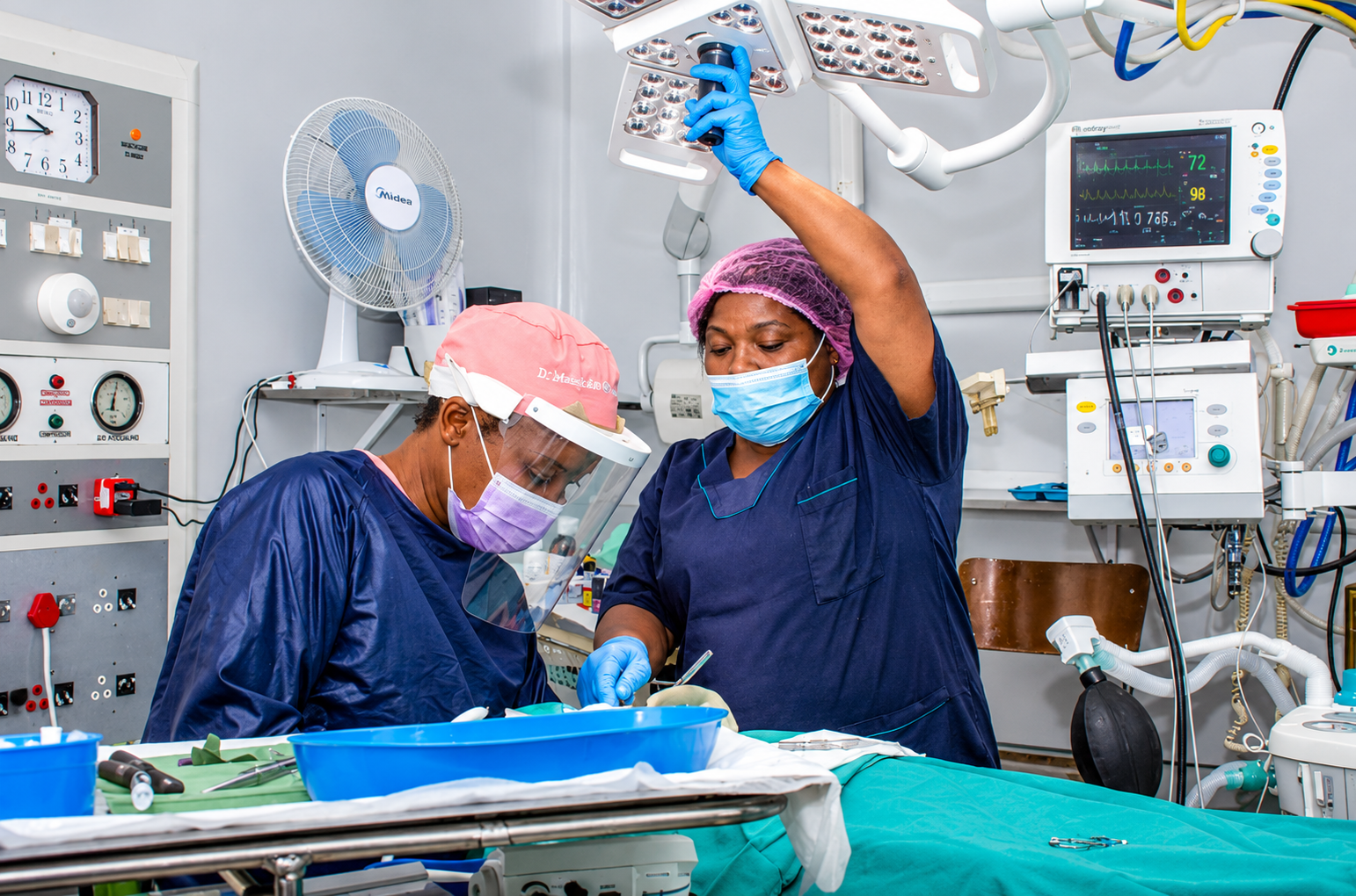 A surgical team at work in an operating theatre